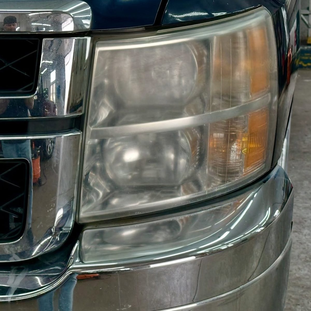 Foggy, oxidized truck headlight before restoration